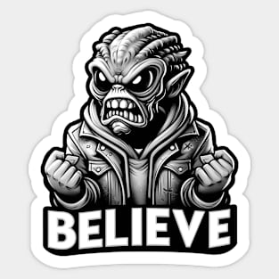 Furious alien monster with the text believe in black and white Sticker